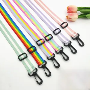 Detail view of colorful polyester lanyards with rotating plastic hooks and star patterns