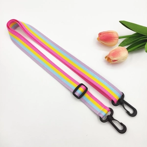 Adjustable rainbow striped bag strap with durable plastic buckles and lobster hooks