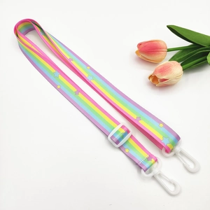Rainbow adjustable shoulder strap with star prints and white plastic swivel hooks