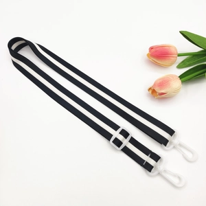 Adjustable black and white striped shoulder strap with white plastic clips and tulips