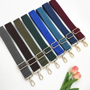 Adjustable herringbone pattern crossbody straps with gold hardware in multiple colors