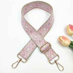 Detail view of 3.8cm colorful bohemian woven bag strap with golden metal clasps