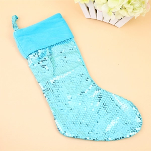 Blue sequin Christmas stocking with light blue velvet cuff for holiday decorations