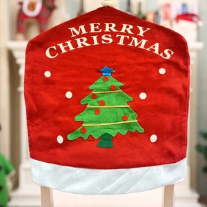 Red Christmas chair cover with Merry Christmas text and festive green 3D tree applique