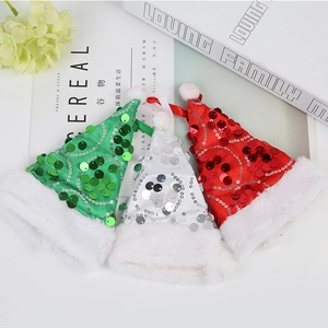Three-piece set of sequined mini Christmas hats in red green and white for festive decor