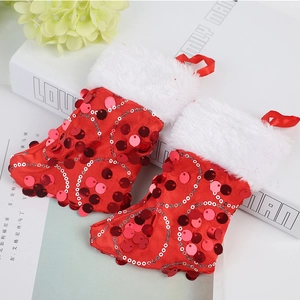Sparkling red sequin Christmas stocking with plush white trim and hanging loop decor