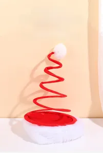 Detail of creative plush spiral spring Christmas hat with soft white pompom and trim