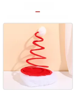 Detail of red spiral spring Santa hat with plush white trim and pom-pom topper