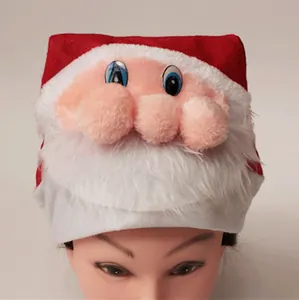 Close-up of Santa Claus plush hat featuring a long white beard and a pink 3D nose