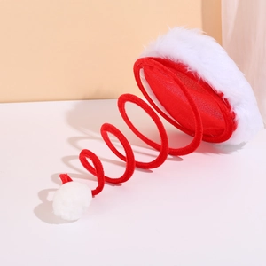 Red spring spiral Christmas hat with soft white plush trim and fuzzy pompom for parties