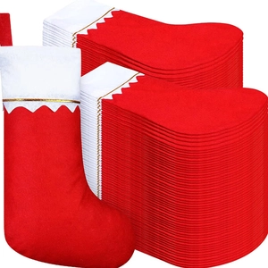 Classic red and white Christmas stockings with gold trim in a large decorative bulk set