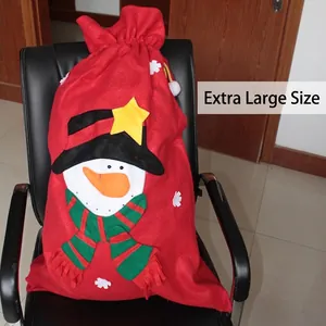 Large red Christmas drawstring gift bag with 3D snowman patch and festive scarf decoration
