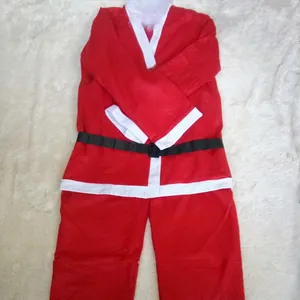 Flat lay of 5-piece non-woven Santa Claus costume for kids with jacket, pants, and belt