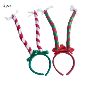 Detail of 2pcs Christmas spiral horn headbands with bows and bells for holiday parties