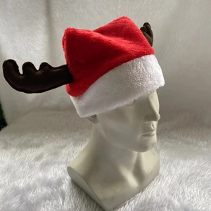 Christmas reindeer antler hat made of red and white plush fabric for festive decoration