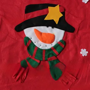 Detailed close-up of handmade 3D felt snowman applique with green striped scarf
