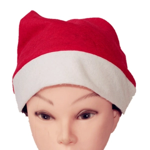 Detail of red fleece Christmas hat with white plush trim on a display head stand