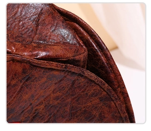 Macro shot of dark brown distressed PU leather texture with stitching for pirate hat