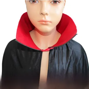 Detail of high stand collar on a black and red double-sided vampire cloak for Halloween