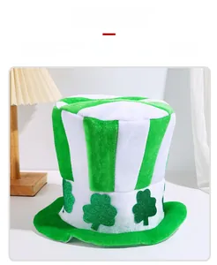 Macro detail of St. Patrick's Day green and white striped top hat with glitter shamrocks