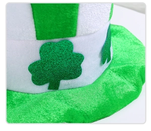Macro view of green and white Saint Patrick's Day hat featuring a felt clover shamrock