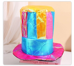 Detail of colorful metallic clown top hat with blue, pink, and gold vertical stripes