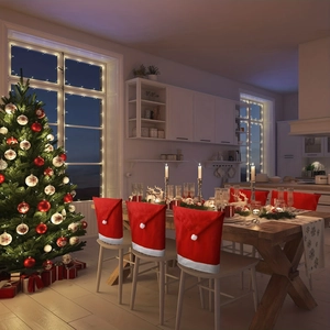 Red non-woven Christmas chair covers set with Santa hat design and white plush pom-poms