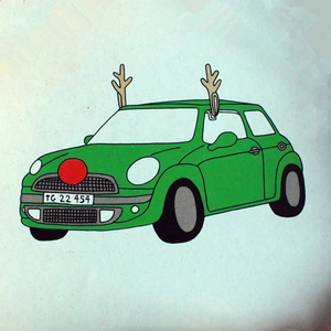 Christmas reindeer car decoration kit with plush antlers and a red nose on a vehicle