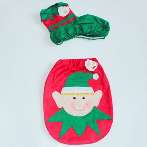 Detailed flat lay of festive red and green Christmas elf costume for pets with cape and hat