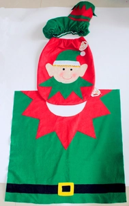 Detail of Christmas elf-themed toilet cover set with red and green felt decorations