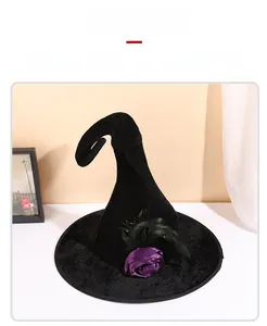 Detail of black velvet witch hat featuring purple silk rose and decorative feathers
