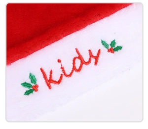 Close-up of red plush Christmas hat with white fur trim and holly embroidery details