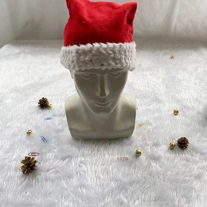 Festive red velvet Christmas hat with shiny sequins and white faux fur trim decoration