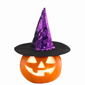 Halloween lit pumpkin jack-o-lantern with a purple sequin witch hat on a white background