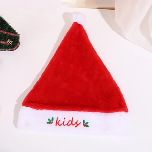Plush red and white Christmas hat for kids with holly leaf embroidery on white background