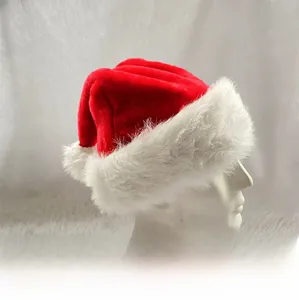 Close-up of a plush red Christmas hat with thick white faux fur trim and extra large pompom
