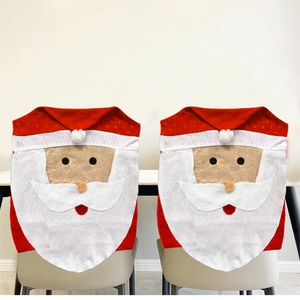 Set of two Santa Claus chair back covers made of red felt for Christmas dining decor
