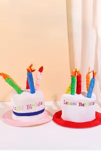 Close-up of plush birthday cake hat featuring colorful 3D candles and fine embroidery