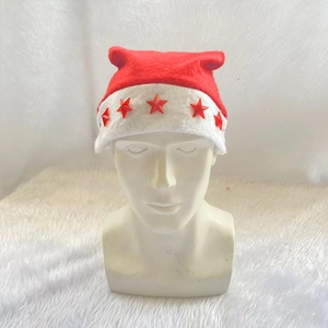 Red and white knitted Christmas hat featuring light-up red stars on plush white background