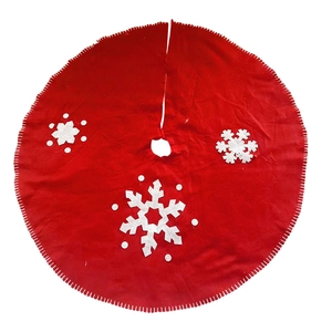 Classic red Christmas tree skirt featuring white snowflake patterns and scalloped edges