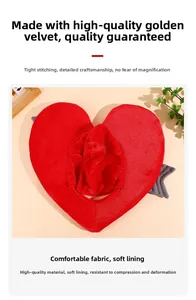 Detail view of red heart plush hat made of gold velvet fabric with tight stitching