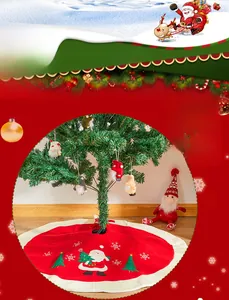 Detail of red Christmas tree skirt with Santa Claus embroidery and gnome plush ornaments