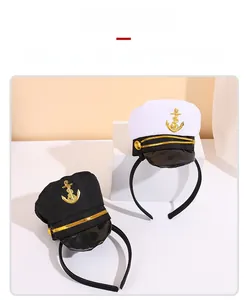 Detail of nautical captain hat headbands with golden anchor emblems and braided cords