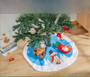 Detailed view of sky blue Christmas tree skirt with snowman and white plush edge