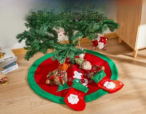 Detailed view of festive Christmas tree skirt with 3D reindeer, Santa and sequined socks