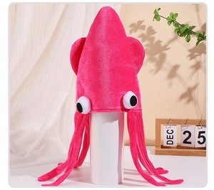 Detail of rose pink velvet octopus hat showing soft plush fabric and large comic eyes