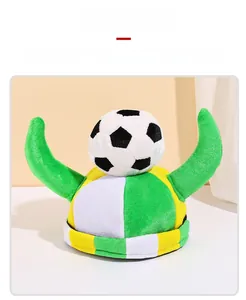 Macro detail of the plush soccer fan hat featuring green horns and football ornament