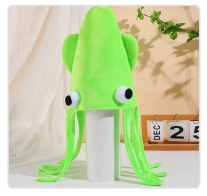 Detail of green velvet squid hat for parties featuring large eyes and long tentacles