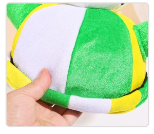 Close-up of three-color plush soccer party hat with green, yellow, and white velvet fabric