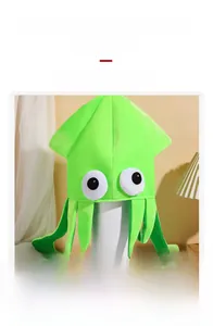 Close-up of green velvet squid hat detailing soft knit fabric and large novelty eyes